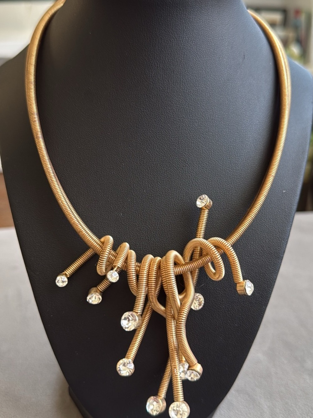 Traci Lynn Gold Tone Knotted Pendant Necklace with Clear Crystals Stunning